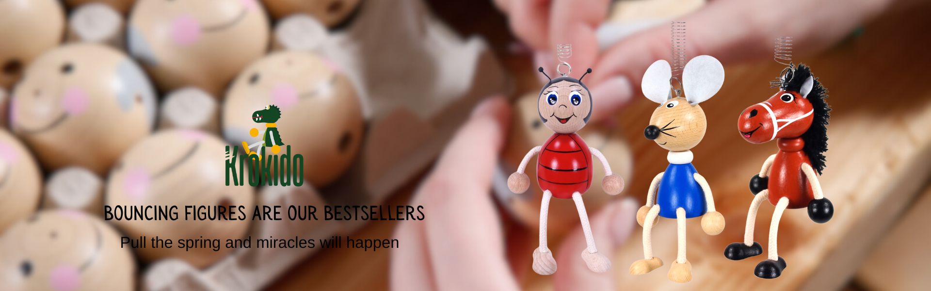 wooden figures with spring krokido
