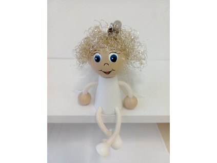 angel wooden figurine on spring