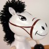 wooden figurine white horse