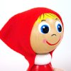 handpainted wooden figure on spring little red riding hood