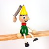 pinocchio wooden bouncing figure