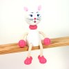 white cat wooden sitting figure