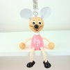 pink mouse wooden figure on spring