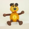 Bear wooden figure on spring