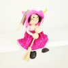 Pink witch figure on spring