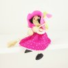Pink witch spring-loaded figure