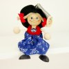blond girl in dress wooden bouncing figure