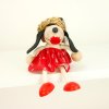 Dog in skirt wooden figure on spring