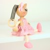 cat pink dress wooden bouncing figure