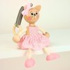 cat in pink dress wooden figure on spring for kids
