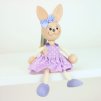 bunny purple dress bouncing wooden doll on spring