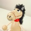 Horse spring-loaded wooden figurine KROKIDO