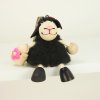 Black sheep wooden doll on spring