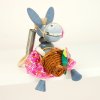 Donkey in skirt wooden figure on spring