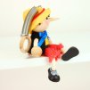 pinocchio yellow hat wooden bouncing doll