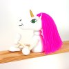 sitting fogure from wood unicorn