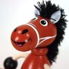 brown horse sitting figure from wood