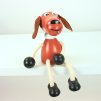 brown dog wooden sitting figure