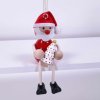Santa with christmas tree wooden figure with spring