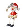 santa claus with gift wooden figurine on spring