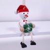 Snowman with hat and gift wooden figure with spring