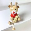 reindeer with christmas tree wooden decoration with spring