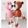 pink bear wooden sitting figurine