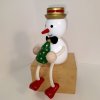 Snowman with tree side