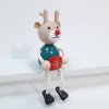 reindeer with christmas gift wooden figure